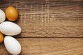 Chicken eggs on wooden background