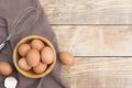 Chicken eggs in a wooden bowl Farm fresh organic eggs laid on a rustic wood Royalty Free Stock Photo