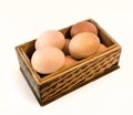 Chicken eggs in a wooden box