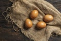 chicken eggs on wooden table Royalty Free Stock Photo