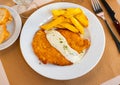 Chicken escalope with roquefort sauce, served with crispy french fries