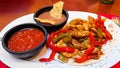 Chicken fajitas with salsa and beans Royalty Free Stock Photo