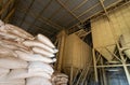 Chicken feed ingredients bags stacked in poultry feed mill plant