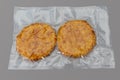 Chicken fillet breaded burger in vacuum packed Royalty Free Stock Photo