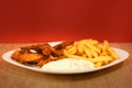 Chicken fingers with french fries and sauce Royalty Free Stock Photo