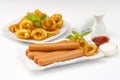 Chicken franks with potato swirls basil and ketchup with mayonnaise Royalty Free Stock Photo