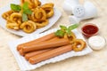 Chicken franks with potato swirls basil and ketchup with mayonnaise Royalty Free Stock Photo