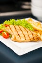 Chicken, French fries and salad