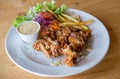 Chicken fried steak with country gravy and french fries. Pork chop, French fries and vegetables. Homemade Country Fried Steak Royalty Free Stock Photo