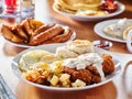 Chicken fried steak covered in gravy with sunny side up eggs Royalty Free Stock Photo