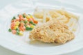 A chicken fried steak with french fries and vegetables Royalty Free Stock Photo