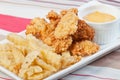 Chicken and fries with sour cream dip Royalty Free Stock Photo