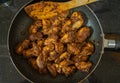 Chicken ghee roast cooked in a pan
