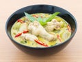 Chicken green curry on wooden background