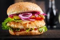 Hamburger. Sandwich with chicken burger, tomatoes, cheese and lettuce. Cheeseburger Royalty Free Stock Photo