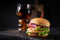 Hamburger. Sandwich with chicken burger, tomatoes, cheese and lettuce. Cheeseburger Royalty Free Stock Photo