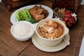 Chicken herb soup with abalone and scallop in pot