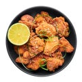 Chicken Karaage in black bowl isolated on white background. Karaage is traditional japanese cuisine dish