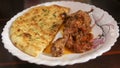 Chicken Karahi Gosht or Kadai Chicken With Garlic Naan.
