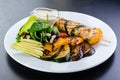 chicken kebab on a skewer and grilled vegetables Royalty Free Stock Photo