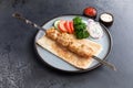 Chicken kebab on a skewer in a plate Royalty Free Stock Photo