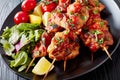 Chicken kebabs chargrilled on skewers, close up Royalty Free Stock Photo