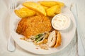 Chicken kiev with basil pesto, potato chips and mayo dip