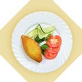 Chicken Kiev cutlet with vegetables. Royalty Free Stock Photo