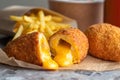 Chicken Kiev Cutlets. Breaded Chicken Kiev breast stuffed with cheese. Royalty Free Stock Photo