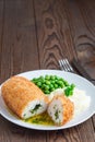 Chicken Kiev, ukrainian cuisine. Cutted chicken cutlet in bread Royalty Free Stock Photo