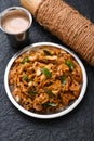Chicken Kothu Parotta a popular South Indian street food in Kerala made with shredded Porotta Royalty Free Stock Photo