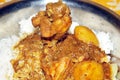 Chicken leg cooked very well . potato & other ingredients . Indian cooking method .