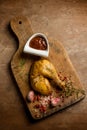 Chicken legs with barbeque sauce over wood Royalty Free Stock Photo