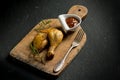 chicken legs with spice over black background Royalty Free Stock Photo