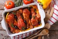 Chicken legs in tomato sauce with olives horizontal top view Royalty Free Stock Photo