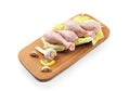 Chicken legs on a wooden tray