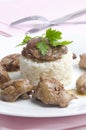 Chicken liver on rice with parsley