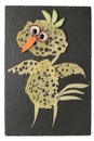 Amusing chicken made with cheese and vegetables on slate tray