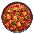 Chicken Madras Curry in black bowl isolated on white. Indian cuisine dish. Asian food and meal Royalty Free Stock Photo