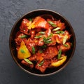 Chicken Manchurian is Indian Chinese cuisine dish with Chicken breasts, bell pepper, tomatoes, soy sauce Royalty Free Stock Photo