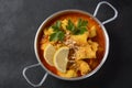 A Chicken Massaman Curry in black bowl at dark background Royalty Free Stock Photo