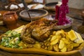 chicken meal in medieval tavern, Hungary