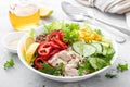 Chicken meat lunch bowl with fresh salad leaves, corn, cucumber, sweet pepper and quinoa Royalty Free Stock Photo