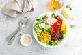 Chicken meat lunch bowl with fresh salad leaves, corn, cucumber, sweet pepper and quinoa Royalty Free Stock Photo