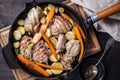 Chicken meat and roasted vegetables on cooking pan Royalty Free Stock Photo