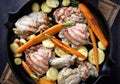 Chicken meat and roasted vegetables on cooking pan Royalty Free Stock Photo