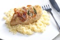 chicken meat on sage baked with bacon and served with couscous Royalty Free Stock Photo