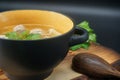 Chicken meatball soup on the cutting board