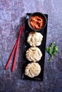 chicken-momos chopsticks food meal ready-to-eat healthy-eating dumpling tradition appetizer chinese-food steamed