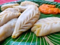 Chicken Momos with spicy chutni, viewed up close Stuffed filling dumplings Royalty Free Stock Photo